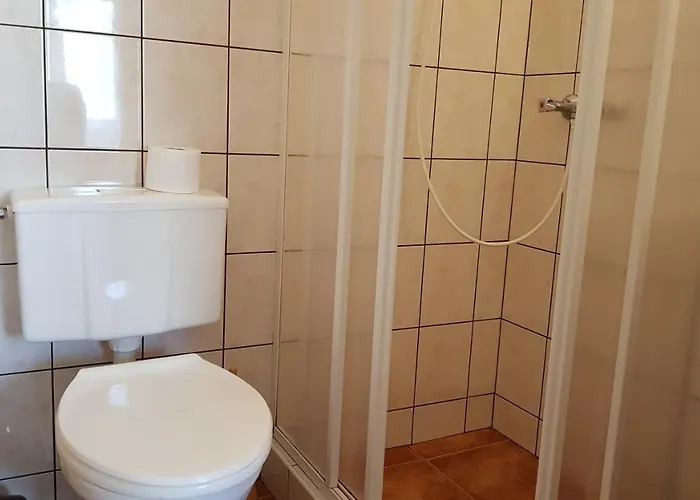 ゲストハウス Wynajem Pokoi *