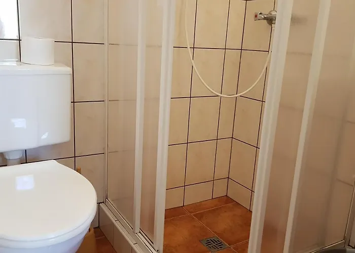 ゲストハウス Wynajem Pokoi *